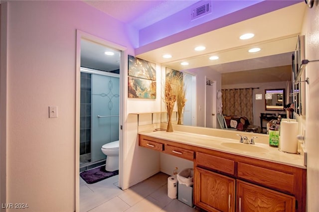 1701 E Katie Ave Unit 72, Las Vegas, NV 89119 - bathroom featuring a stall shower, vanity, tile patterned floors, and recessed lighting