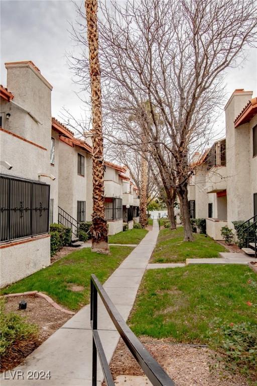 1701 E Katie Ave Unit 72, Las Vegas, NV 89119 - surrounding community featuring a residential view and a lawn