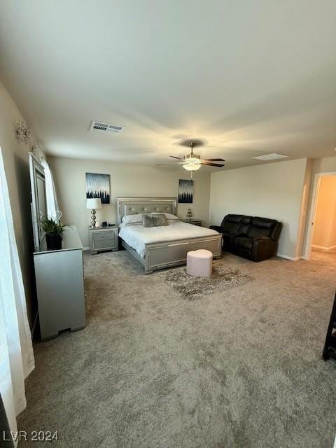 bedroom with ceiling fan and carpet