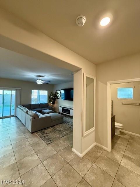 hallway with light tile patterned floors