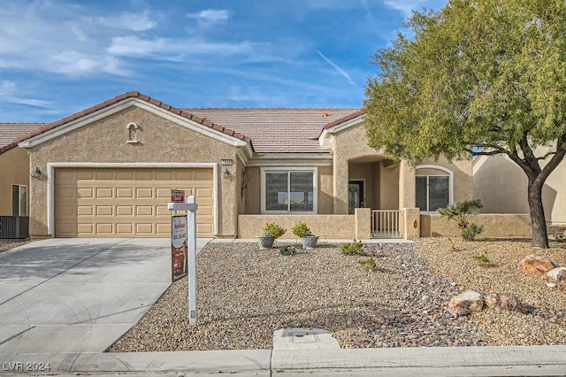 single story home with a garage