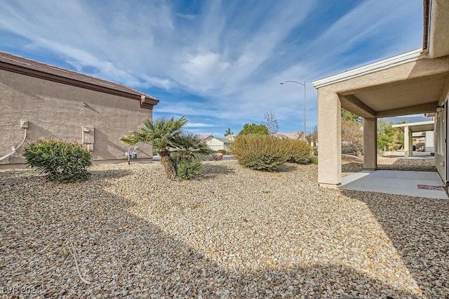 view of yard featuring a patio