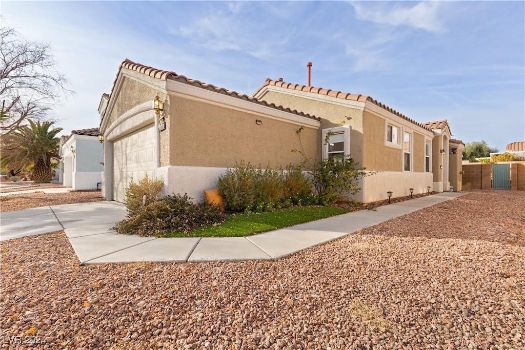 view of home's exterior featuring a garage