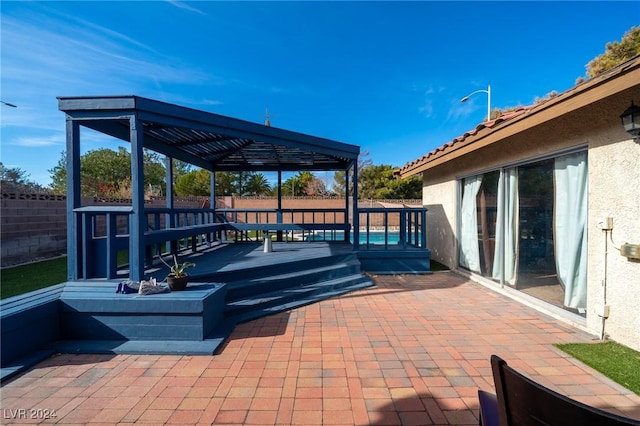 view of patio with a wooden deck