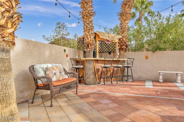 view of patio featuring a bar