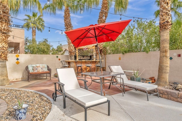 view of patio featuring a bar