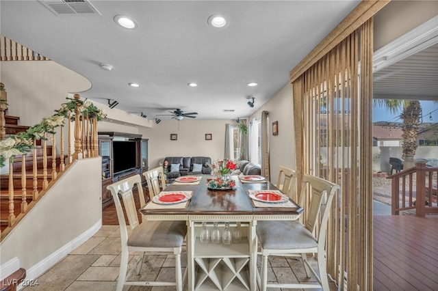 dining space featuring ceiling fan