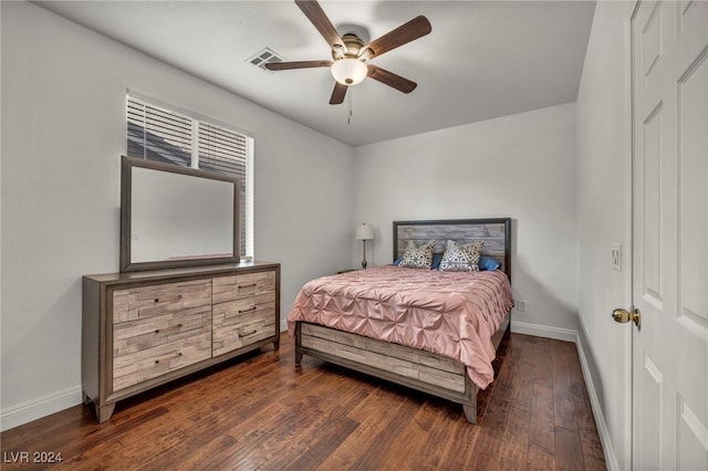 bedroom featuring ceiling fan and dark hardwood / wood-style flooring