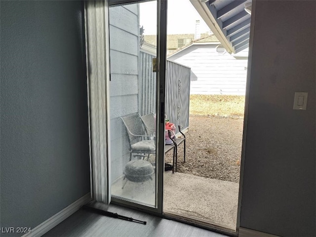 doorway to outside featuring hardwood / wood-style floors