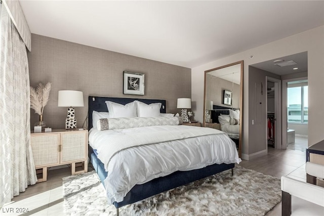 bedroom featuring ensuite bath