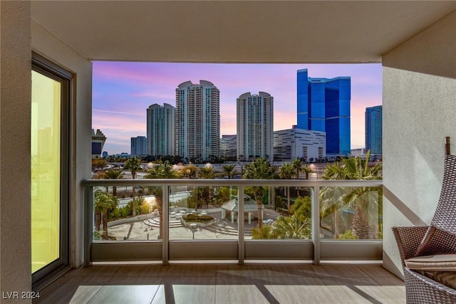 view of balcony at dusk