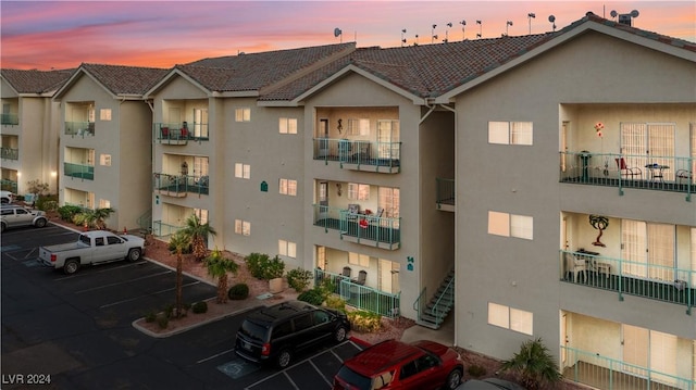 view of outdoor building at dusk