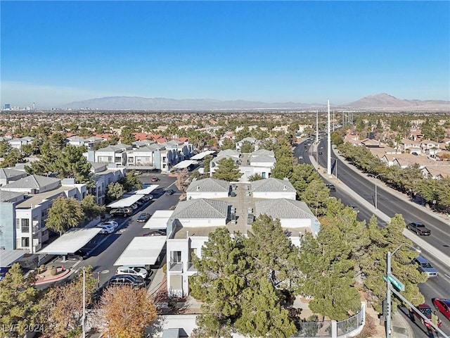 bird's eye view with a residential view and a mountain view