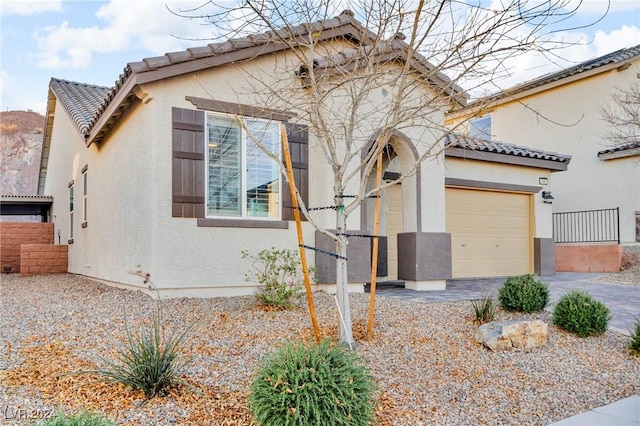 view of front of house with a garage