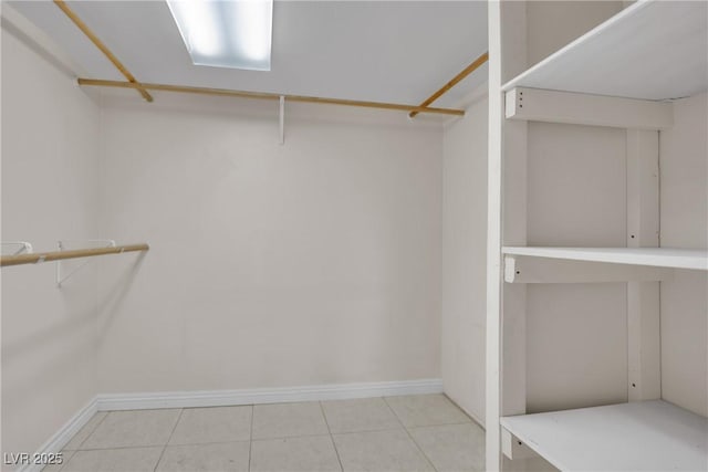 walk in closet featuring light tile patterned floors