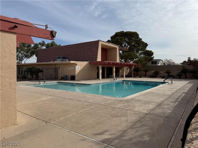 view of swimming pool featuring a patio