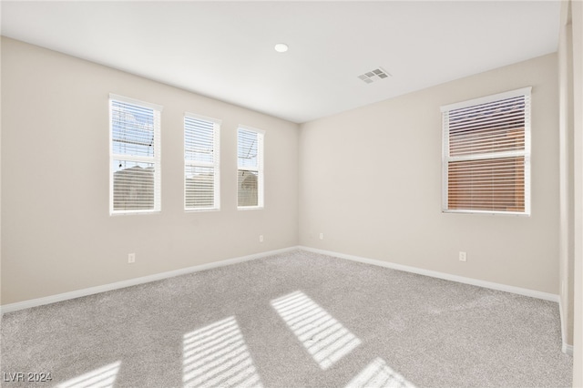 view of carpeted spare room