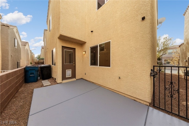 rear view of property with a patio