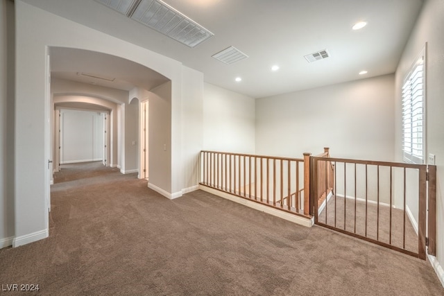 hall with carpet floors