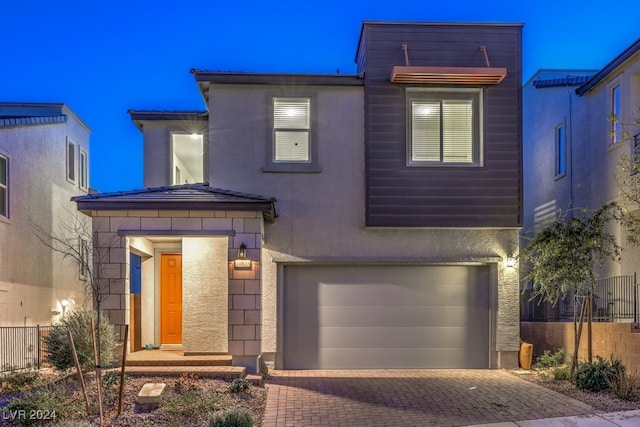 view of front of home with a garage