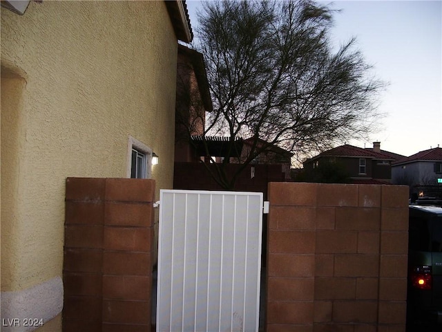 view of property exterior at dusk