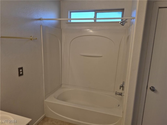 bathroom with tub / shower combination and tile patterned floors