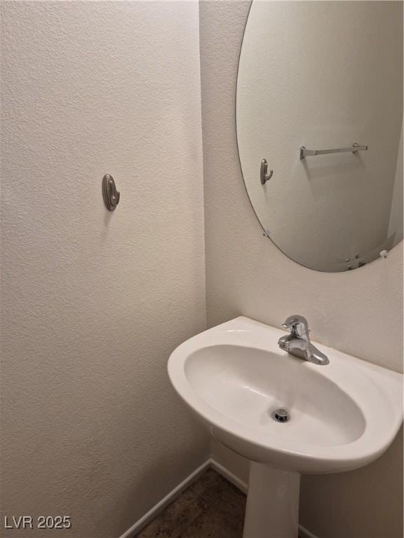 bathroom with tile patterned flooring