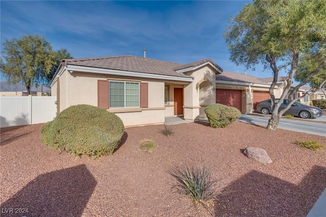 ranch-style house with a garage