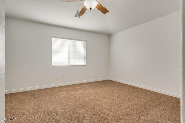 carpeted empty room with ceiling fan