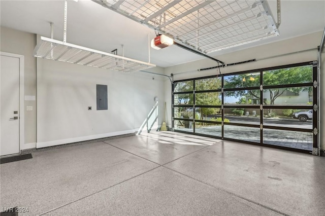 garage featuring a garage door opener and electric panel