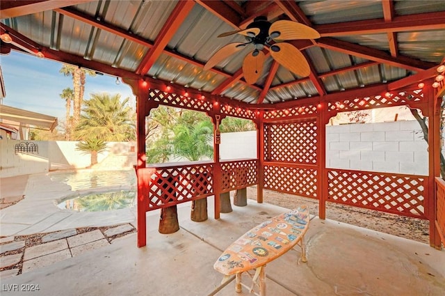 view of patio / terrace featuring a gazebo and ceiling fan