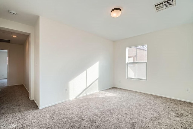 empty room with carpet floors