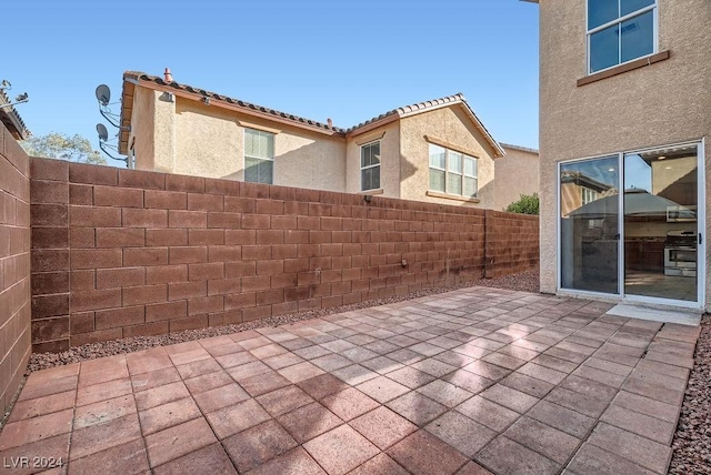 view of patio with a grill