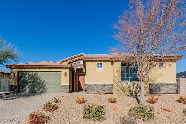 view of front of home with a garage