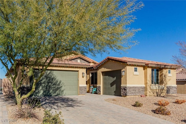 view of front of property featuring a garage