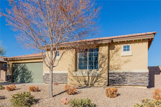 view of property exterior with a garage