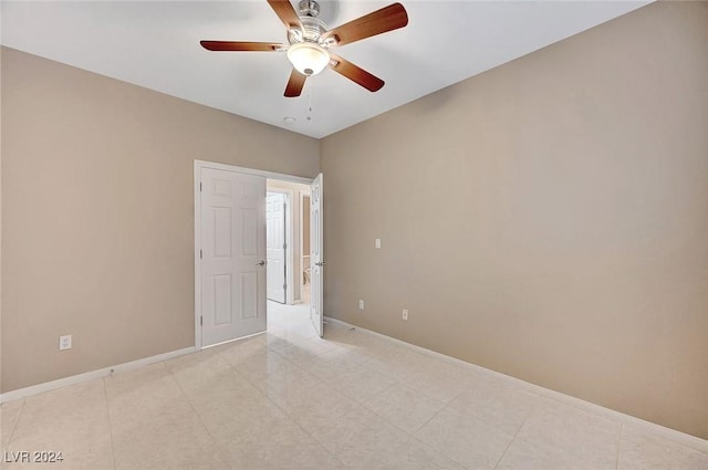 spare room featuring ceiling fan