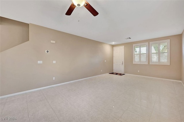 spare room featuring ceiling fan