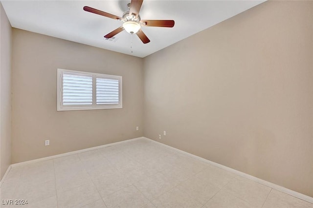 unfurnished room with ceiling fan