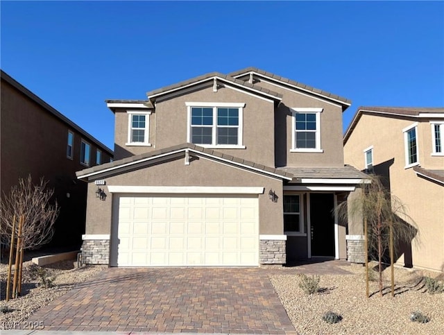 view of front of property featuring a garage