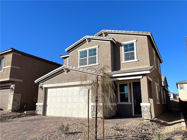 view of front of property featuring a garage