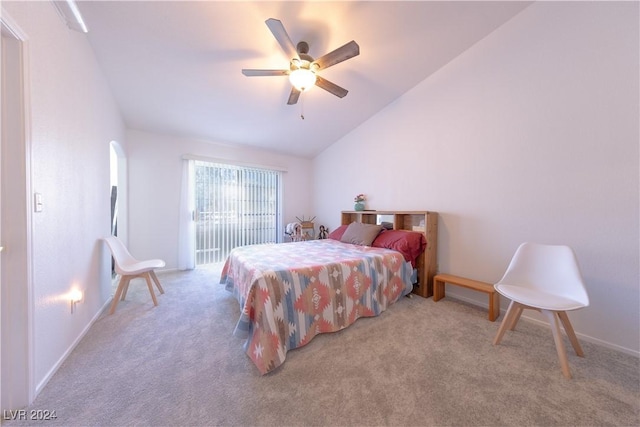 carpeted bedroom featuring ceiling fan and lofted ceiling