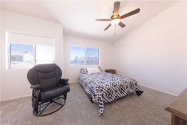 carpeted bedroom featuring ceiling fan and lofted ceiling