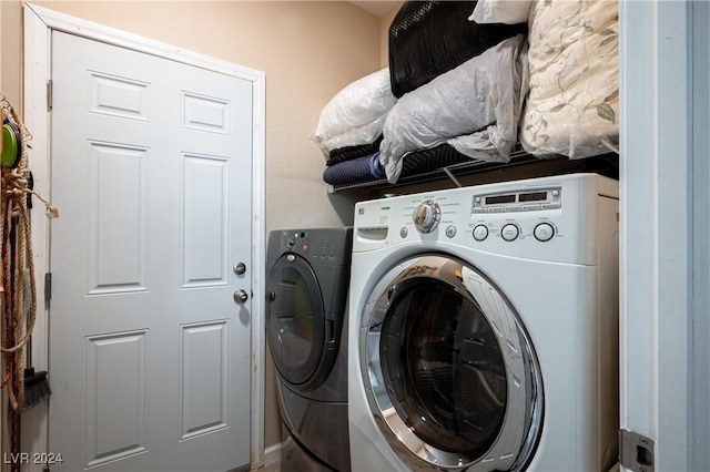 washroom featuring separate washer and dryer