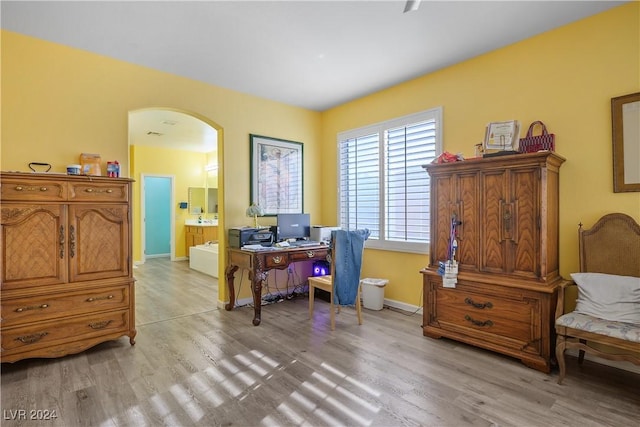 office area with light wood-type flooring