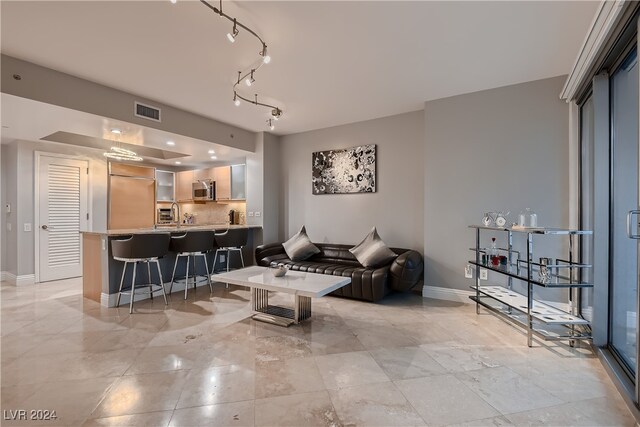 living room featuring sink