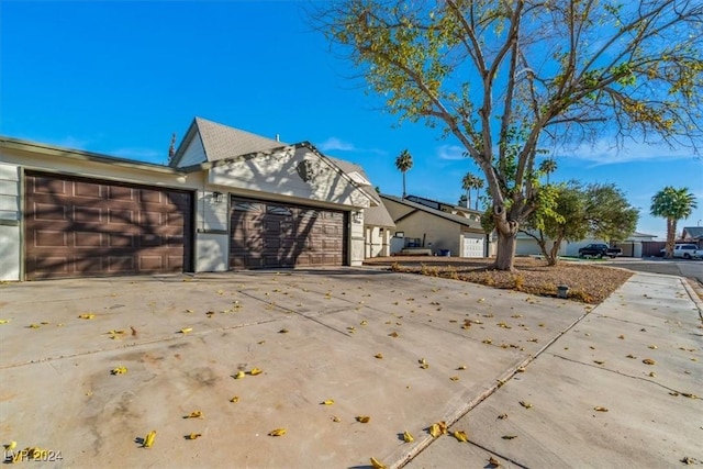 view of home's exterior with a garage