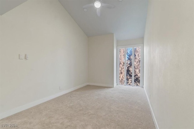 interior space featuring carpet flooring, ceiling fan, and lofted ceiling