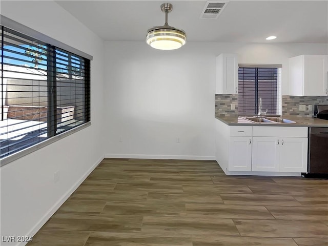 unfurnished dining area with sink