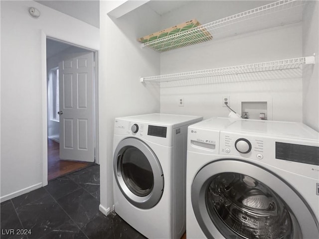 laundry room featuring washing machine and dryer